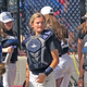 Catcher Beth Greenwood in the dugout.